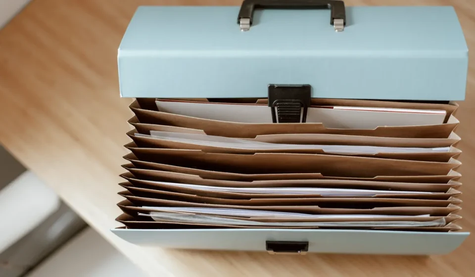 Accordion file box filled with papers